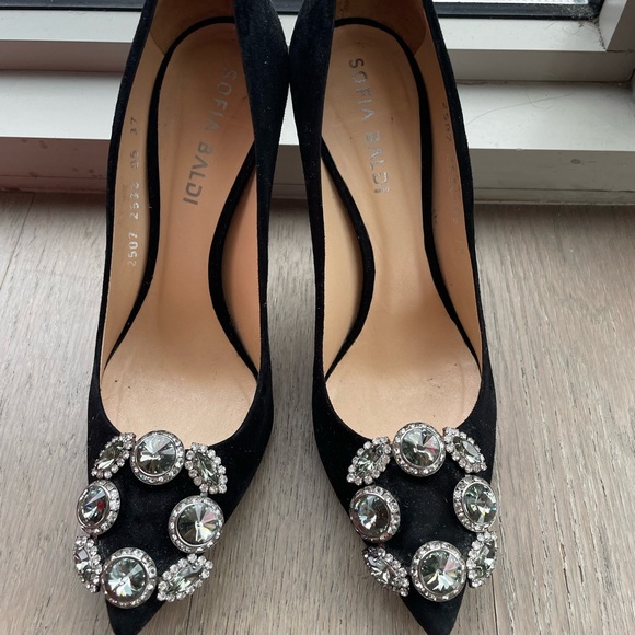 Italian high heel shoes with diamond embellishments.